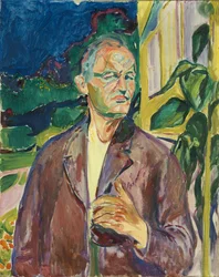 Autoportrait devant le mur de la maison