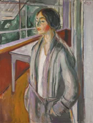 Jeune femme sur la véranda