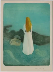 Jeune femme au bord de la mer