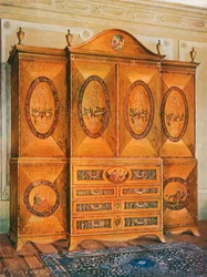 Armoire en bois de satin, incrustée de bois de tulipier, de houx, d