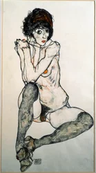 Femme nue assise