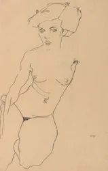 Femme nue agenouillée