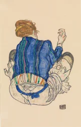 Femme assise, vue de dos