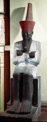Antiquité égyptienne : statue du pharaon Montouhotep II (ou Mentouhotep II). XIe dynastie. De Deir el-Bahari. Dim. 83 cm. Le Caire, Musée égyptien