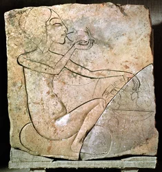 Relief représentant une princesse mangeant un canard rôti, du Palais Nord à Tell El-Amarna, Nouvel Empire, vers 1353-1337 av. J.-C.