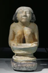 Femme avec un tamis. De Gizeh, mastaba de Djacha. Milieu (calcaire)