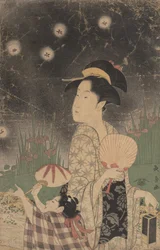 Femme et enfant attrapant des lucioles