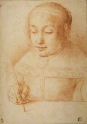 Jeune femme écrivant ou dessinant