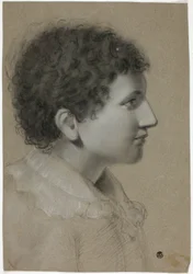 Profil de jeune homme aux cheveux bouclés