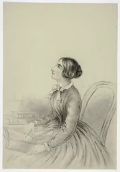 Jeune femme inspirée en lisant