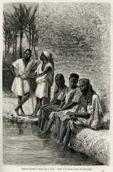 Hommes et femmes noirs du Sahara, sur les rives de l