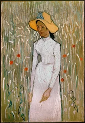 Femme dans un champ de coquelicots