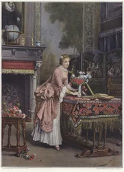 Une femme plaçant un vase de fleurs sur une table