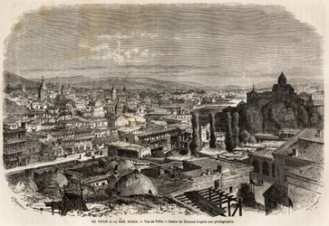 Vue de Tiflis, ou Tbilissi, dessin de Théorond, pour illustrer le voyage de M. Moynet en 1858 vers la mer Noire et la mer Caspienne. Gravure dans « Le Tour du monde, nouveau journal des voyages », Paris