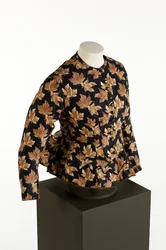 Corsage noir à motif imprimé de feuilles d