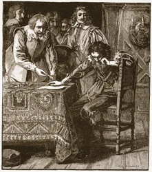 Charles signant la Commission d