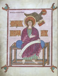 Saint Jean avec son symbole, des Évangiles de Lindisfarne, 710-721