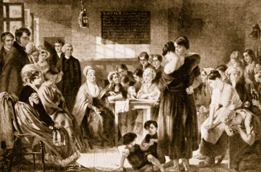 Elizabeth Fry lisant la Bible dans une prison