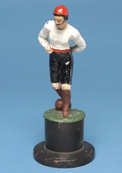 Footballeur avec le ballon à ses pieds