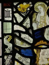 Fragments incluant un jeune saint avec un oiseau