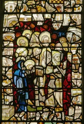 La fenêtre est représentant une procession : Chandeleur ou Fête-Dieu