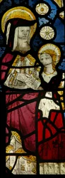 Chapelle sud, fenêtre S6 représentant Sainte Anne enseignant la Vierge à lire