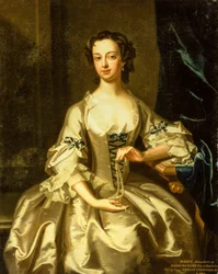 Portrait de Mary Rand devant un rideau drapé