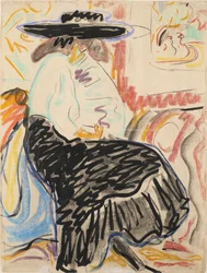 Femme assise dans le studio