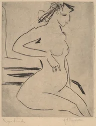 Femme nue assise