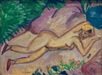 Jeune fille couchée sur la plage