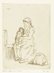 Mère avec enfant sur ses genoux