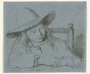 Garçon endormi avec un chapeau