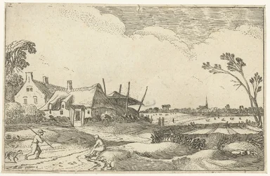 Ferme sur un chemin et vue sur les champs