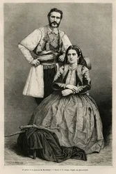 Portraits du prince du Monténégro Nicolas I Petrovicz Niegosch (1841-1921) et de sa femme, Milena, née Voukovich (1847-1923), dessin de E.Ronjat, pour illustrer le voyage au Monténégro, en 1874, par Charles Yriarte (1832-1898). Gravure dans Le tour du mond