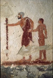 Un vieil homme accompagné d