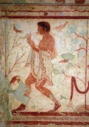 Art étrusque : fresques représentant des scènes de banquet, détail représentant un joueur de flûte. Tombe du Triclinium. Ve siècle av. J.-C. Musée archéologique national de Tarquinia, Italie