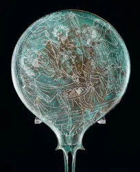 Miroir représentant une scène de banquet, artefact en bronze de Preneste (Latium). Civilisation étrusque, IVe siècle av. J.-C.