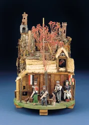 Scène mécanique militaire de soldats, les figures en bois devant une maison en chaume, fin 19ème siècle