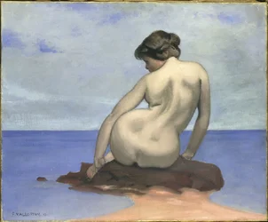 Baigneuse assise sur un rocher