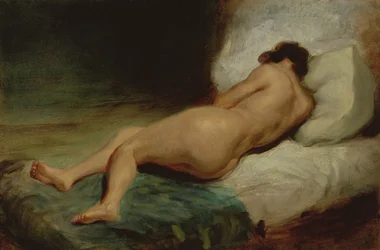 Femme nue allongée sur un lit