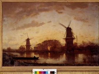 Les rives de la rivière Amstel avec des moulins aux Pays-Bas
