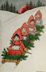 Quatre petites filles sur une luge