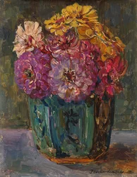 Nature morte avec des zinnias dans un pot vert