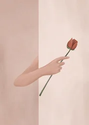 Une main tenant une rose