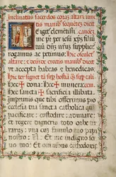 Initial T : Un prêtre célébrant la messe