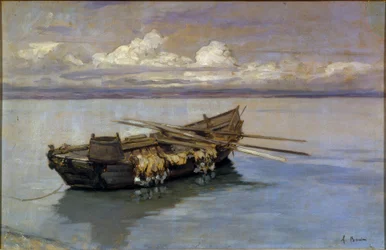 Barque chargée de filets sur la rive