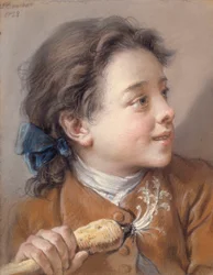 Garçon avec une carotte