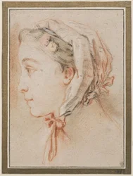Tête de femme, de profil, coiffée d