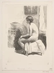 Modèle féminin nu, assis dans une pièce