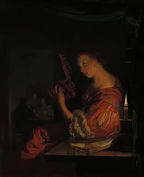 Femme accordant un luth